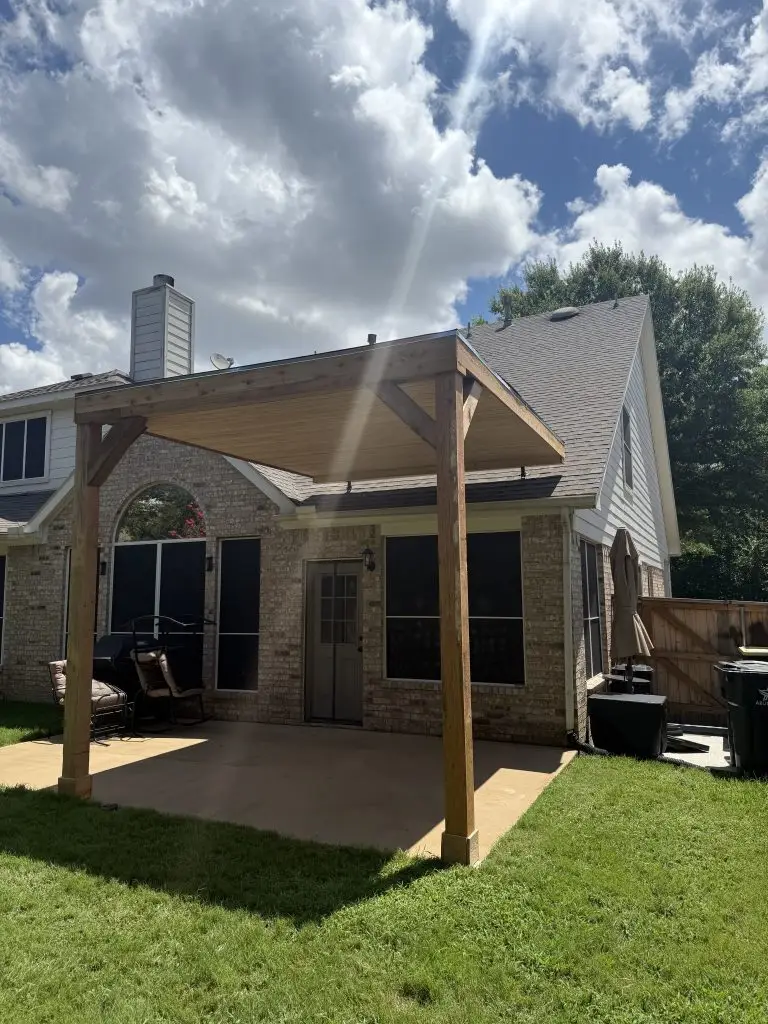 patio contractor texas patio cover pergola attached with roof risers by STR Top Construction